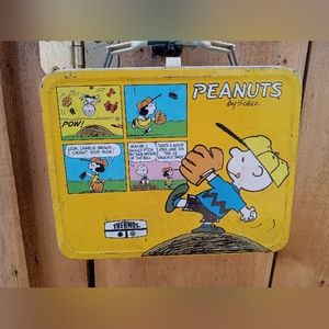 Vintage Charlie Brown Peanuts metal lunch box with thermos.